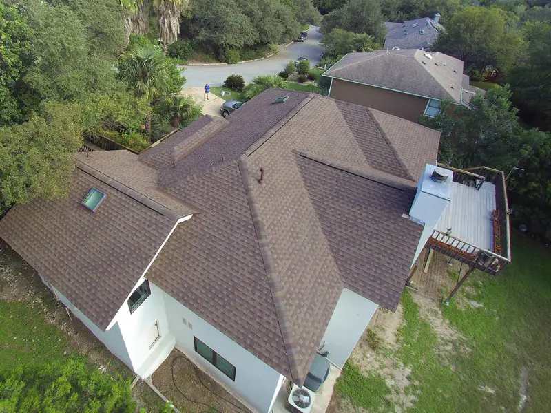 New brown shingles installed on roof in Austin, TX