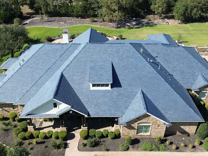 Large home with new blue DaVinci roof tiles